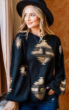 Holy CUTENESS!😍 Everyone’s favorite sweater is now available in a new sparkly festive print, and it is GORGEOUS! Featuring a chic black background with Aztec print in a shimmery metallic gold, this cozy sweater is made of a warm chunky knit, with trendy puffy sleeves and a beautiful flattering fit! Looks fabulous paired with denim skinnies, black leather leggings or flares for a fun & fabulous winter outfit! Relaxed, loose fit. If in between, choose your smaller size. S/M 6-10 M/L 12-16 Poly/sp Black Jacquard Knit Long Sleeve Top, Black Jacquard Knit Tops For Fall, Festive Holiday Black Top, Black Jacquard Knit Tops For Winter, Black Top For Festive Holiday Occasions, Black Jacquard Knit Crew Neck Top, Gold Crew Neck Sweater For Fall, Black Sweater For Holiday In Fall, Black Tops For Winter Holiday