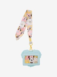 Visit the Disney Parks in style with this Minnie Mouse lanyard! Featuring an applique of the mouse's silhouette made of flowers on the removable ID badge  this lanyard includes an allover print of Minnie among flowers  perfect for adding to any outfit.A BoxLunch Exclusive!Polyester; polyurethaneImported Disney Pin Lanyard, Disney Lanyard, Mouse Silhouette, Disney Dragon, Woody Toy Story, Disney Addict, In My Feelings, Disney Aesthetic, Loungefly Disney