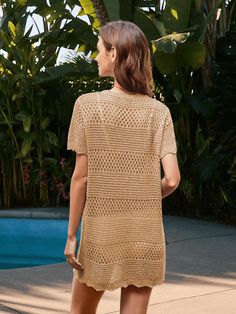 Get ready to turn heads in the Christa Crochet Mini Sweater Dress! This dress features a unique crochet knit fabrication, making it perfect for any occasion. Stay cozy and stylish with its mini length and on-trend khaki color. Perfect for a playful and fun fashion statement (without the hassle of a full length sweater)! Size Guide: Model is 5’2” tall, and has a 33.2” bust, 24.5”waist, & 36.7” hips. She is wearing a S / US 4 / AU 8. This dress is true to size. Feature: Scallop Neckline. Short sleeves. Crochet knit fabrication. Mini Length. Relax Fit. Scallop hem. Not Lined. Material: 100% Viscose. Care Instructions: Machine wash / Cold hand wash. Crochet Mini Sweater, Scallop Neckline, Mini Sweater, Scallop Hem, Cold Hands, Mini Sweater Dress, Khaki Dress, Unique Crochet, Fun Fashion