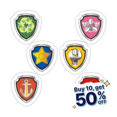 four different colored stickers with an anchor, star, and shield design on them