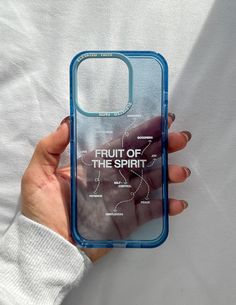 a person holding up a phone case with the words fruit of the spirit on it