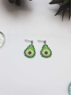 the earrings are made out of seed beads