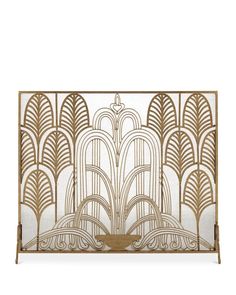 an art deco screen in gold and white