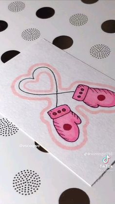 two valentine's day cards with hearts and mittens on them, one is pink