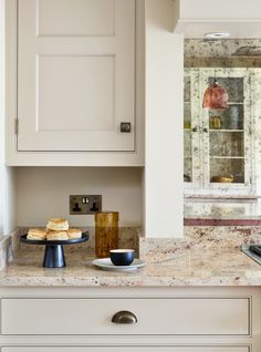 the kitchen counter is clean and ready to be used for breakfast or desserts,