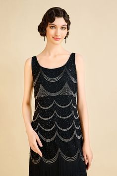 Picture yourself at a glamorous Gatsby-inspired soiree, the air filled with excitement and jazz melodies. The dress's U-shaped neckline exudes sophistication, while its H-line silhouette ensures comfort and style as you dance the night away. The geometric patterns infuse a contemporary flair into this timeless design, ensuring it stands out elegantly for those with a passion for vintage fashion. Features: U-shaped neckline H-line silhouette Minimalist geometric patterns Delicate beads Great stre Fitted Sleeveless Flapper Dress For Party, Chic Night Out Flapper Dress, Summer Gatsby Style Flapper Dress For Evening, Gatsby Style Summer Evening Flapper Dress, Elegant Summer Flapper Dress For Party, Elegant Summer Party Flapper Dress, Summer Evening Gatsby Flapper Dress, Glamorous Fitted Flapper Dress For Night Out, Elegant Sleeveless Flapper Dress For Night Out