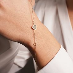 Celebrate the bond of love and friendship with our stunning 14K Solid Gold Heart Bracelet. Crafted with precision and elegance, this bracelet features a delicate heart design, symbolizing affection and connection. Made from high-quality 14K solid gold, it's a timeless piece of jewelry that radiates beauty and sentiment. Perfect for gifting to a friend or loved one, this bracelet is a meaningful expression of love and appreciation. Whether it's for Mother's Day or any special occasion, this uniqu Luxury Diamond Heart Bracelet For Anniversary, Luxury Sterling Silver Heart Bracelet For Gift, Luxury Sterling Silver Heart Bracelet For Anniversary, Heart-shaped Bracelet With Heart Charm For Promise, Luxury Sterling Silver Bracelets For Valentine's Day, Luxury Adjustable Heart Bracelet, Luxury White Gold Heart Bracelet, White Gold Heart Diamond Bracelet For Valentine's Day, Heart-shaped White Gold Diamond Bracelet For Valentine's Day