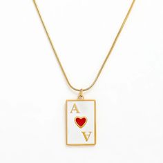 Ace of Hearts Card Necklace, a unique and stylish accessory that adds a touch of charm to your ensemble. Celebrate your love for games and make a bold fashion statement with the Ace of Hearts Card Necklace – a piece that effortlessly combines elegance, symbolism, and a dash of whimsy. Gold: 18k gold platingMaterial: Stainless steelLength: 41+5cm Waterproof jewelry Hypoallergenic Tarnish Free Glazd Pouch with every order Free US shipping Easy Exchange & Return policy PRODUCT INFOAll our jewelry a Ace Of Hearts Card, Hearts Card, Zodiac Cards, Card Necklace, Ace Of Hearts, Waterproof Jewelry, Gold Piece, Heart Cards, Formal Style