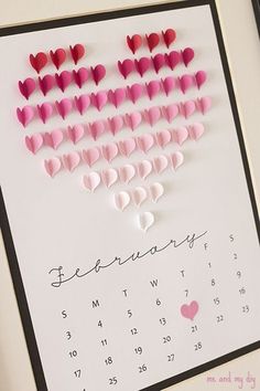 a calendar with hearts cut out of it