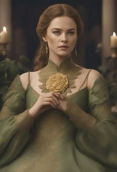 a woman in a green dress holding a golden rose with two candles around her neck