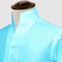 "High Open Collar Full Sleeves Shirt Tailor-Made On Order shirt 𝘈 𝘩𝘪𝘨𝘩 𝘤𝘰𝘭𝘭𝘢𝘳 𝘴𝘩𝘪𝘳𝘵 𝘪𝘴 𝘢 𝘤𝘭𝘢𝘴𝘴𝘪𝘤 𝘢𝘯𝘥 𝘵𝘪𝘮𝘦𝘭𝘦𝘴𝘴 𝘴𝘵𝘺𝘭𝘦 𝘵𝘩𝘢𝘵 𝘢𝘥𝘥𝘴 𝘢 𝘵𝘰𝘶𝘤𝘩 𝘰𝘧 𝘴𝘰𝘱𝘩𝘪𝘴𝘵𝘪𝘤𝘢𝘵𝘪𝘰𝘯 𝘵𝘰 𝘢𝘯𝘺 𝘰𝘶𝘵𝘧𝘪𝘵. 𝘛𝘩𝘪𝘴 𝘴𝘵𝘺𝘭𝘦 𝘧𝘦𝘢𝘵𝘶𝘳𝘦𝘴 𝘢 𝘤𝘰𝘭𝘭𝘢𝘳 𝘵𝘩𝘢𝘵 𝘴𝘵𝘢𝘯𝘥𝘴 𝘶𝘱 𝘢𝘯𝘥 𝘦𝘯𝘤𝘪𝘳𝘤𝘭𝘦𝘴 𝘵𝘩𝘦 𝘯𝘦𝘤𝘬, 𝘱𝘳𝘰𝘷𝘪𝘥𝘪𝘯𝘨 𝘢 𝘳𝘦𝘧𝘪𝘯𝘦𝘥 𝘢𝘯𝘥 𝘱𝘰𝘭𝘪𝘴𝘩𝘦𝘥 𝘭𝘰𝘰𝘬. 𝘐𝘵'𝘴 𝘢 𝘷𝘦𝘳𝘴𝘢𝘵𝘪𝘭𝘦 𝘱𝘪𝘦𝘤𝘦 𝘰𝘧 𝘤𝘭𝘰𝘵𝘩𝘪𝘯𝘨 𝘵𝘩𝘢𝘵 𝘤𝘢𝘯 𝘣𝘦 𝘸𝘰𝘳𝘯 𝘸𝘪𝘵𝘩 𝘢 𝘴𝘶𝘪𝘵 𝘧𝘰𝘳 𝘧𝘰𝘳𝘮𝘢𝘭 𝘰𝘤𝘤𝘢𝘴𝘪𝘰𝘯𝘴 𝘰𝘳 𝘥𝘳𝘦𝘴𝘴𝘦𝘥 𝘥𝘰𝘸𝘯 𝘸𝘪𝘵𝘩 𝘫𝘦𝘢𝘯𝘴 𝘧𝘰𝘳 𝘢 𝘤𝘢𝘴𝘶𝘢𝘭 𝘭𝘰𝘰𝘬. 𝘛𝘩𝘦 𝘩𝘪𝘨𝘩 𝘤𝘰𝘭𝘭𝘢𝘳 𝘢𝘭𝘴𝘰 𝘰𝘧𝘧𝘦𝘳𝘴 𝘢𝘥𝘥𝘪𝘵𝘪𝘰𝘯𝘢𝘭 𝘤𝘰𝘷𝘦𝘳𝘢𝘨𝘦 𝘢𝘯𝘥 𝘱𝘳𝘰𝘵𝘦𝘤𝘵𝘪𝘰𝘯 𝘢𝘨 Blue Top With Concealed Placket And Spread Collar, Blue Button-up Dress Shirt With Concealed Placket, Light Blue Slim Fit Elegant Tops, Blue Collared Top For Business, Elegant Light Blue Slim Fit Top, Semi-formal Light Blue Fitted Top, Light Blue Fitted Semi-formal Top, Fitted Light Blue Semi-formal Top, Fitted Light Blue Top For Semi-formal Occasions