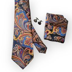 Want a special tie for nice clothes or weddings? Our Gold Navy Blue Silk Tie Pocket Square Set is perfect. It's made of good silk and makes your outfit look fancy. The colors are nice, and the tie and pocket square are made well. Good for parties or weddings. The set has a tie and a pocket square. The tie is 59 inches long and 3.34 inches wide. You can use a warm iron if you need to. Elegant Blue Suit And Tie Accessories For Father's Day, Blue Elegant Tie For Father's Day, Elegant Blue Tie For Father's Day, Elegant Multicolor Suit And Tie Accessories For Formal Occasions, Elegant Multicolor Ties For Wedding, Elegant Multicolor Formal Suit And Tie Accessories, Elegant Multicolor Neckwear With Ties, Elegant Multicolor Formal Neckwear, Elegant Multicolor Neckwear For Business