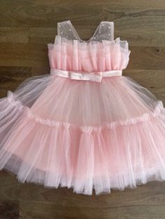 Beautiful Tulle Dress with or without pearls made for your baby girl or toddler. This dress will be a show stopper! Spring Princess Style Pageant Dress, Pink Sleeveless Baptism Dress For Party, Spring Season Princess Style Pageant Dress, Spring Sleeveless Princess Pageant Dress, Cute Ruffled Baptism Dress For Party, Princess Style Tutu Dress For Summer Pageant, Princess Style Summer Tutu Dress For Pageant, Spring Tulle Pageant Dress, Sleeveless Summer Pageant Dress