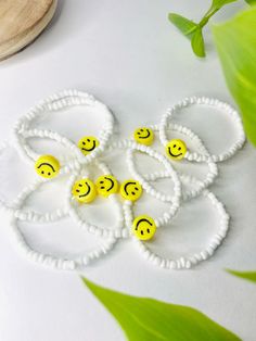 Cheerful Adjustable Beaded Bracelets With Smiley Face, Adjustable Smiley Face Round Bead Bracelets, Cheerful Smiley Face Beaded Bracelets With Round Beads, Cheerful Beaded Bracelets With Smiley Face, Fun Round Beaded Smiley Face Bracelets, Cheerful Adjustable White Beaded Bracelets, Cheerful White Beaded Bracelets With Round Beads, Fun Smiley Face Round Beads Bracelets, Cheerful White Bracelets With Colorful Beads