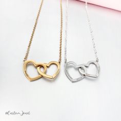 "~ Double Interlocking Hearts Necklace ~  Introducing our exquisite Double Interlocking Hearts Necklace, a symbol of everlasting love. Crafted with precision, this necklace not only beautifully intertwines two hearts but also offers the unique option to personalise it with 1-4 names, elegantly engraved around the sides, creating a cherished keepsake for you or your loved ones. SPECIFICATIONS * Style: Double interlocking open hearts necklace, allowing multi names / short sentences to be engraved * 1-4 text can be personalised * Material: 18k Gold, Silver, Rose Gold, Stainless Steel * Colour: Gold, Silver or Rose Gold * Length: 45cm (can be adjusted on request) * Heart Size: approx. 22mm each * Item is nicely packaged, ready to be gifted PERSONALISATIONS * Select either 1-4 names to be engra Short Sentences, Open Heart Necklace, Interlocking Hearts, Double Heart Necklace, Hearts Necklace, Everlasting Love, Double Heart, Two Hearts, Open Heart