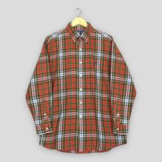 Vintage 90s Ralph Lauren Checkered Flannel Shirt Large Polo Ralph Lauren Plaid Checked Flannel Polo Red Checked Buttondown Shirt Size L Good Used Condition. No Stains and No Holes. Size (On Tag) : Size L **To make sure if it FITS YOU, refer at the exact measurements. Size Measurement (All measurements were taken lying flat) : Width [armpit to armpit] : 23.5 inches / 70 cm Length [shoulder to end of garment] : 31 inches / 79 cm THIS IS USED CLOTHING! PLEASE DON`T EXPECTED IT TO BE LIKE NEW OR DON Red Vintage Flannel Shirt, Classic Multicolor Shirt For Fall, Classic Multicolor Fall Shirt, Classic Red Cotton Flannel Shirt, Classic Red Long-sleeved Flannel Shirt, Classic Red Flannel Shirt For Fall, Vintage Red Flannel Shirt With Button Closure, Red Vintage Flannel Shirt With Button Closure, Vintage Red Flannel Shirt For Fall