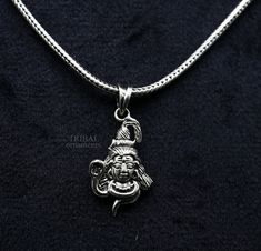 Indian Hindu Idols god Shiva/ mahadev/ Bholenath design vintage antique style pendant, best gifting unisex jewelry from India. Metal-925 sterling silver. Item type-Pendant/ Locket Weight-1.950 grams. Length-3.0centimeter. Width-1.4 centimeters. Stamped-925. Finish-Oxidized. note :chain is not include in this price, to purchase chain please visit following links: https://www.etsy.com/listing/823425858/16-to-30-long-screw-chain-925-sterling?ref=listings_manager_grid Make excellent gifting and coll Hindu Idols, Shiva Pendant, Pendant Locket, God Shiva, Customized Jewelry, Unisex Jewelry, Lord Shiva, Antique Style, Design Vintage