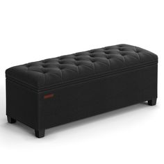 a black bench with buttons on the top and bottom, sitting in front of a white background