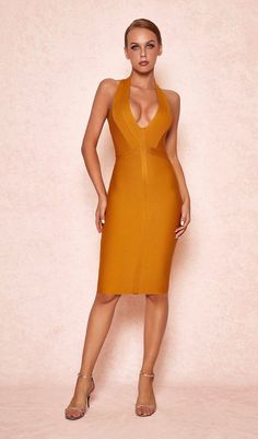 DescriptionThis sleek and stylish plunge bandage dress is made from our signature Bandage fabric to caress your curves and create a smooth sexy silhouette. The front has a plunge neckline and clever mock wrap panelling to really snatch that waist and accentuate your curves. The back has a slight racer cut and the knee length skirt keeps it classy. Wear yours with tonal pumps. Made from stretch bandage fabric. Dress Length: Approx 96cmMaterials: Bandage (90% Rayon. 9% Nylon. 1% Elastane/Elastano) Fitted V-neck Halter Dress For Date Night, Fitted Halter Neck V-neck Dress For Date Night, Elegant V-neck Bandage Mini Dress, Stretch V-neck Bandage Dress For Date Night, Fitted V-neck Bandage Mini Dress, Midi Bandage Dress For Date Night, Chic Stretch Bandage Dress, Elegant V-neck Bandage Dress For Summer, Stretch Bandage Dress With V-neck For Evening