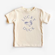 This Lucky Duck graphic tee is 100% cotton, has a tear away tag for your child's comfort and comes in 3 natural Bella Canvas colors. In sizes 2T-5T, make this Silly Duck Shirt the cutest birthday theme shirt or everyday trendy tee! DETAILS .100% Cotton .Bella Canvas tee .Tear away label .Runs true to size .Props in any photos are not included and are for styling purposes only .Colors may slightly vary from styled photos  SIZING This graphic tee design will be printed on a Bella Canvas shirt that is high quality, comfortable and so soft! Sizing runs true to size (please refer to the size chart for exact measurements). If you'd like a more oversized look I would recommend ordering a size up. If you prefer a tighter fit, size down. Sizes are for toddlers and range from 2T-5T. CARE .Turn insid The Snuggly Duckling Shirt, Duck Hunting Birthday, One Lucky Duck, Silly Duck, Duck Hunting Shirts, Duck Graphic, Hunting Birthday, Duck Birthday, Silly Shirt