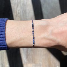 W E L C O M E  T O  [  T I M E + S P A C E  ] 🪐  Elevate your vibration with this handmade minimalist blue silk string bracelet featuring 2-3mm sterling silver and  authentic healing crystal beads:- 💎 S A P P H I R E =  ( calm ) Designed as a manifestation bracelet with no closure, to be tied and worn continuously until the cord eventually wears away. However, there is an option to include an adjustable sterling sliding bead.  📏 Length: 30cm to fit all wrists (please add comments to customise Handmade Sapphire Bracelets In Spiritual Style, Handmade Spiritual Sapphire Bracelets, Spiritual Blue Hand-wrapped Bracelets, Blue Spiritual Crystal Bracelet, Spiritual Sapphire Beaded Hand-strung Bracelet, Presentation Cards, Mini Envelopes, Wish Bracelets, String Bracelet