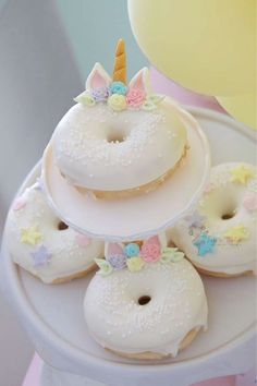 there are donuts that have unicorn decorations on them