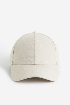 Cap in a woven linen and ramie blend. Adjustable tab at back with metal buckles. Cotton sweatband. Casual Beige Linen Hat, Casual Everyday Linen Hat, Adjustable Casual Linen Hats, Beige Six-panel Baseball Cap For Spring, Adjustable Linen Cap, Interior Textiles, Blouse Jeans, Room Fragrances, Cardigan Sweater Jacket