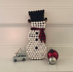 a christmas decoration made out of toilet paper rolls