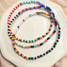 Everyday Multicolor Beaded Chain Bracelets, Minimalist Beaded Necklace With Round Letter Beads, Minimalist Beaded Necklace With Letter Beads, Friendship Bracelets With Spacer And Round Beads, Minimalist Beaded Bracelets With Colorful Beads For Festivals, Minimalist Beaded Chain Bracelets, Minimalist Beaded Bracelet With Letter Beads, Minimalist Colorful Beaded Bracelets For Festivals, Everyday Tiny Beads Bracelets