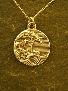 14K Gold Wave Pendant on a 14K Gold Chain - Etsy Unique 14k Stamped Gold Jewelry, Hand Cast 14k Gold Jewelry, Engraved Bronze 14k Gold Necklaces, Gold Medallion Jewelry Hand Cast, Gold Medallion Hand Cast Jewelry, Antique Hand Cast Round Pendant Necklace, Hand Cast Gold Sterling Silver Jewelry, Symbolic Yellow Gold Hand Cast Jewelry, Hand Cast Sterling Silver Gold Jewelry