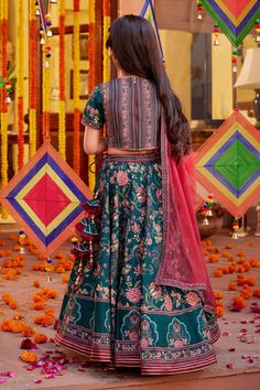 Emerald green and maroon attached cancan lehenga with multi colored bageecha and peacock pattern highlighted with hand embroidery. Comes with coordinated blouse and maroon dupatta. - Aza Fashions Festive Dola Silk Lehenga With Dabka, Festive Dabka Lehenga In Dola Silk, Green Lehenga With Dabka For Festivals, Bollywood Style Dabka Dola Silk Choli, Traditional Drape Lehenga With Dabka For Diwali, Traditional Dabka Lehenga For Diwali, Green Sets For Navratri Traditional Ceremonies, Green Sets For Navratri Ceremonies, Festival Green Lehenga With Dabka Details