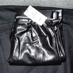 The Pants Are Brand New, But Have Some Scuffs/Blemishes As Seen On Pics. Size: L Material: Polyurethane, Polyester Waist Laid Flat: Approx 17" Inseam: Approx 32" Length: Approx 44" Color: Black Style #: 5427 533 Faux Leather Bottoms With Side Zipper For Work, Faux Leather Bottoms For Work, Edgy Leather Pants With Zipper For Work, Edgy Leather Pants For Work With Zipper Closure, Edgy Leather Pants With Zipper Closure For Party, Chic Black Bottoms With Metal Zipper, Black Leather Trousers With Zipper Closure, Party Faux Leather Bottoms With Side Zipper, High Waist Leather Pants With Zipper For Party