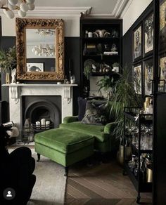 a living room filled with furniture and a large mirror on the wall over a fireplace