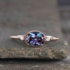 2Ct Oval Cut Alexandrite Women's Solitaire Engagement Ring 14K Rose Gold Finish  THIS Ring IS READY TO MADE A ORDER    ✔ Metal Purity : 925 Sterling Silver ✔ Main Stone Shape : Oval ✔ Main Stone : Alexandrite ✔ Main Stone Color : Purple ✔ Main Stone Creation : Simulated ✔ Main Stone CT Weight : 2Ct ✔ Ready to Ship in 3-5 Business Days ♥ Custom Birthstone Ring ♥  The most unique jewelry you can find, perfect gift for you and your loved one  ♥ BIRTHSTONE COLOR ♥ * Design can be personalized with your BIRTHSTONE COLORS: January - Garnet February - Amethyst March - Aquamarine April - Clear Crystal May - Emerald June - Light Amethyst July - Pink Ruby August - Dark Peridot September - Sapphire October - Light Tourmaline November - Yellow Topaz December - Blue Zircon O T H E R ∙ I N F O R M A T I 14k Rose Gold Oval Rings, Oval Gemstone Ring In 14k Rose Gold, Oval 14k Rose Gold Ring With Gemstone, Oval 14k Rose Gold Rings, Oval 14k Rose Gold Gemstone Rings, Custom Birthstone Ring, Ring Style, Birthstone Ring, Solitaire Engagement