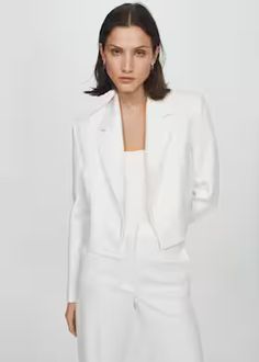 Shopping bag Chic V-neck Suits For Spring, Chic Structured Suits For Office Wear, Party Blazer With Structured Shoulders And Notch Lapel, Chic Structured Office Blazer, Elegant Spring Blazer With Lapel Collar, Elegant Lapel Collar Blazer For Spring, Sleek Notched Blazer For Spring, Sleek Spring Notched Blazer, Chic Structured Blazer For Office Wear