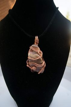 A beautiful piece of petrified wood wrapped in copper wire made 100% original for an original you! Healing Brown Copper Wire Jewelry, Earthy Brown Copper Wire Jewelry, Rustic Wire Wrapped Copper Jewelry, Red Stones, Fancy Necklace, Necklace Red, Wood Necklace, Heart Shape Pendant, Petrified Wood