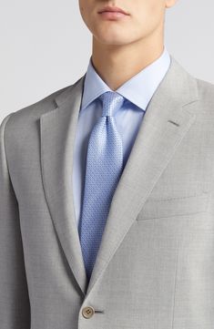 Italian wool woven in a subtly heathered grey brings polish and distinction to a suit styled with traditional detailing for all-occasion versatility. Jacket has notched lapels; four-button cuffs; chest pocket; flap pockets; side vents Cuff buttons may not be attached. Jackets purchased at full price can have the sleeve length customized for free at your local Nordstrom Trousers have zip fly with button-tab closure; slant pockets; back button-welt pockets Jacket is lined Unhemmed 100% wool Dry cl Gray Business Casual Suits With Pressed Crease, Classic Gray Suits For Work, Tailored Gray Suit And Tie Accessories For Formal Occasions, Gray Business Suits With Notch Lapel, Elegant Tailored Gray Suit And Tie Accessories, Gray Notch Lapel Suits For Formal Occasions, Classic Gray Suits With Welt Pockets, Tailored Gray Suit For Formal Occasions, Classic Gray Suits For Wedding