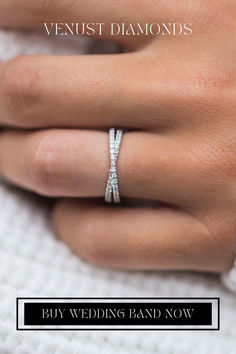 a woman's hand with a wedding band on it and the words, venus diamonds buy