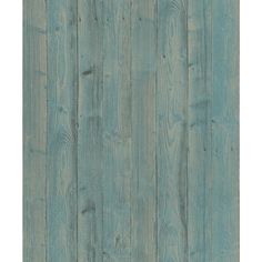 a wooden wall with blue paint and wood grains on the sides, as well as an area rug