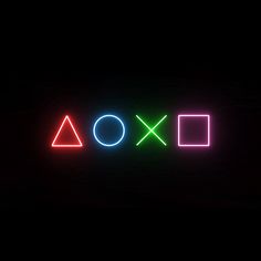 a neon sign that says xoxo in different colors on a black background,