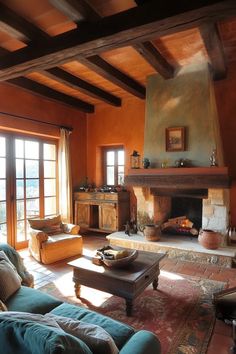 a living room filled with furniture and a fire place