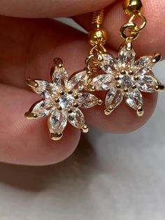 I take a portion of all sales and donate. A portion can be donated to mission fields, another time to Disabled Veterans (My Father served this Country's), Children's Hospitals, ect.. Thank you for helping me to help others.Gold Plated Tiny Cubic Zirconia Flower Earrings Please message me at the checkout, if you would like the item with a gift box (Complimentary) To return to my homepage, click the below: https://www.etsy.com/shop/AllisonsJewels Food Necklace, Funky Necklace, Flower Earrings Gold, Fruit Necklace, Earrings Dainty, Unique Jewelry Designs, Women's Jewelry And Accessories, Pearl Gemstone, Crystal Flower