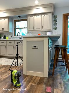 the kitchen is clean and ready to be used as a photographer's studio area