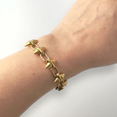 This Barbie Chain Bracelet combines boldness and playfulness in one stunning design. Made from tarnish-resistant stainless steel, it features a striking double spike chain that adds an edgy yet elegant touch to any outfit. Perfect for stacking or wearing solo, this versatile bracelet is a must-have for those who want to make a statement. Available in 18K yellow gold or white gold plating, it’s the ideal accessory for those looking to showcase their fun, fearless, and feminine side in every look. Adjustable Edgy Metal Chain Bracelet, Edgy Adjustable Metal Chain Bracelet, Edgy Bracelets With Adjustable Chain, Edgy Adjustable Jewelry For Everyday, Edgy Adjustable Gold Jewelry, Edgy Adjustable Chain Link Jewelry, Edgy Everyday Chain Jewelry, Edgy Double Chain Link Jewelry, Minimalist Metal Chain Bracelet With Double Chain