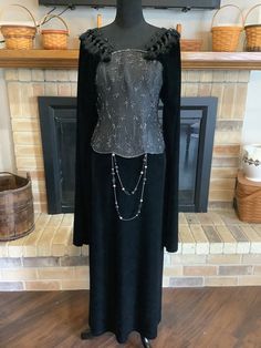 This is a designer Renaissance dress with a black velvet skirt.  Top corset is elaborately beaded and trimmed with gems and tassels.  Velvet sleeves are long and flowing.  Size 10. You will never see another like this. Elegant Embellished Dress For Costume Party, Elegant Costume Dress With Sequins, Black Rennaisance Dress, 1600s Witch Dress, Black And Gold Medieval Dress, Luxury Baroque Medieval Dress Costume, Black Tudor Dress, Fair Outfit, Black Velvet Skirt