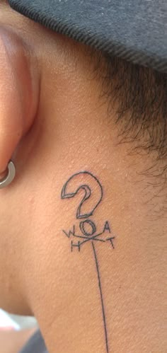 a person with a tattoo on their neck