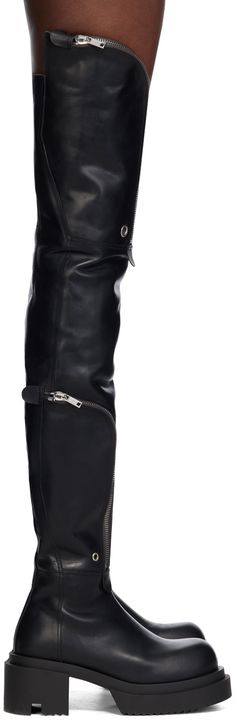 Thigh-high heavyweight vegetable-tanned waxed groppone leather boots in black. · Eyelets and zip pockets at outer side · Zip closure at inner side · Rubber block heel · Rubber platform midsole · Treaded rubber sole · Platform: H1.75 · Heel: H3 Supplier color: Black Thigh High, Rick Owens, Thigh Highs, Side Zip, Leather Boots, Block Heels, Apparel Accessories, Rubber Sole, Zip Pockets