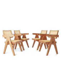 several wooden chairs are arranged in a row