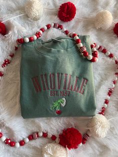 Get in the festive spirit with our Christmas Whoville Sweatshirt! Perfect for the holiday season. This sweatshirt is not only comfortable and cozy - it is made of a high quality preshrunk fleece to keep you warm throughout the winter months.  This sweatshirt is available in 6 colors:  🎄 White 🎄 Pepper Gray 🎄 Light Gray 🎄 Blue Spruce 🎄 Light Green (as seen in listing photo) 🎄 Crimson Red (words will be white) If there is a color you have in mind other than the ones listed, send me a message Christmas Whoville, Gift For Friends Christmas, Friends Christmas, Embroidered Crewneck, Christmas Gifts For Friends, Stocking Stuffer Gifts, Christmas Lettering, Winter Fits, Sweatshirt Christmas