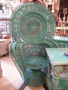 two green wicker chairs sitting next to each other